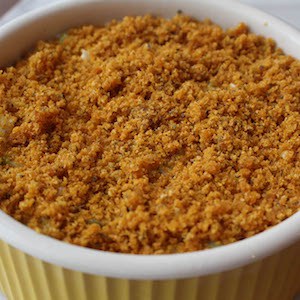 Parmesan Squash Casserole is topped with breadcrumbs.