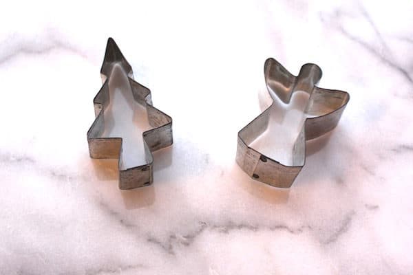 Cookie cutters. This is the best type of cookie cutter in my humble opinion. These are open in the middle, which makes it easy to get the cookies out of them to bake, and the cookies will most likely hold together and not break.