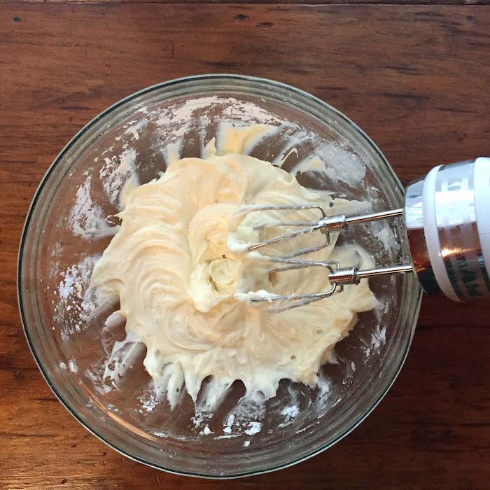 Beat slowly at first. The powdered sugar may fly out of the bowl.