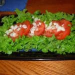 Bitter leaf lettuce, tomato and onions is a good combination for Vinegar Dressing