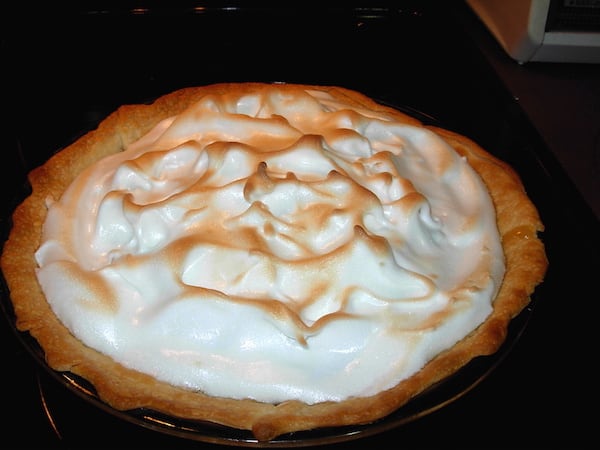 Lemon Meringue Pie uses a prebaked pie crust.