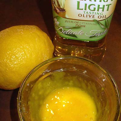 Step 3: Whisk in the lemon and olive oil.