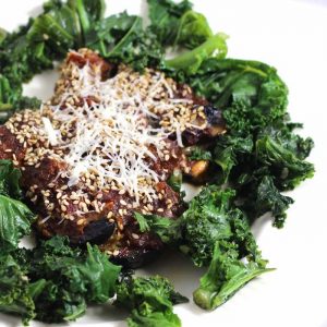 Eggplant Gina, served on top of Wilted Kale, the perfect vegetarian meal.
