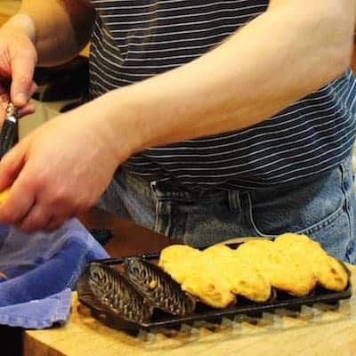 Don removes the Jalapeño Cornbread from the corn sticks mold.