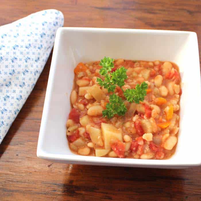White Bean and Barley Stew is a deliciously filling vegan meal.