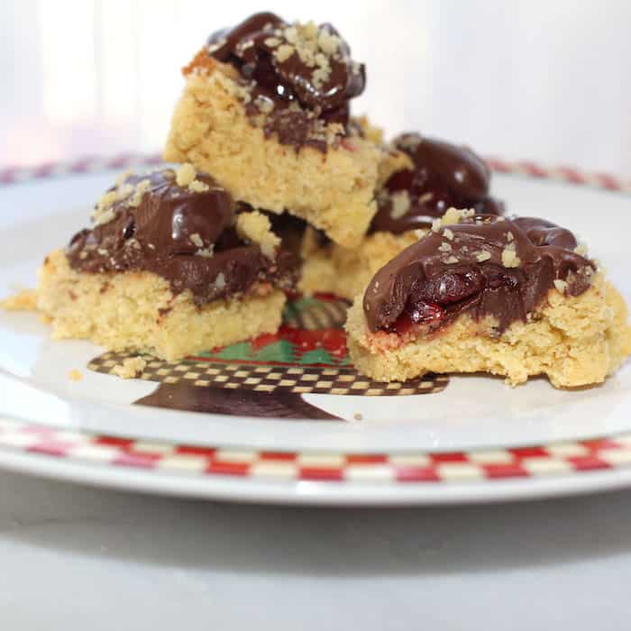 Chocolate Cherry Squares Cookies are so pretty on the plate and people love them.