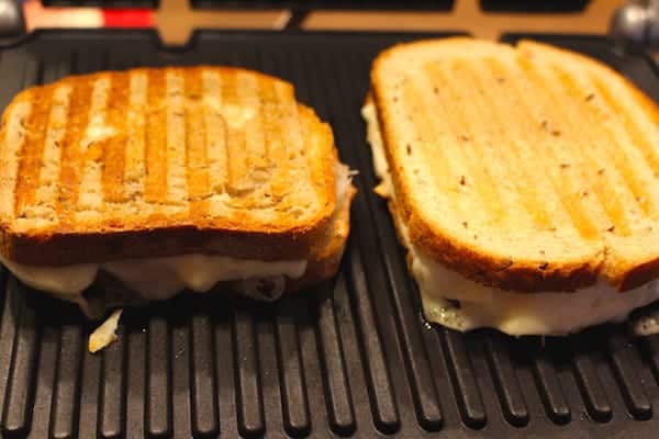 Gluten Free Portabella Reuben Sandwich and Wheat Bread Portabella Reuben Sandwich grilling on the Cuisinart Griddler. Almost done.