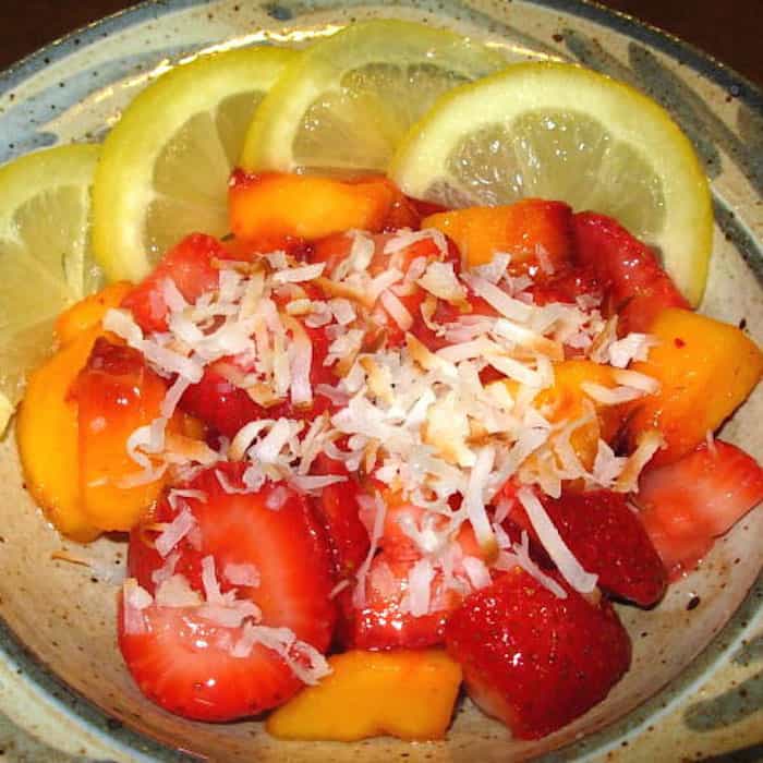 Strawberries and Peaches in Lemon with Coconut. So simple. Super good.