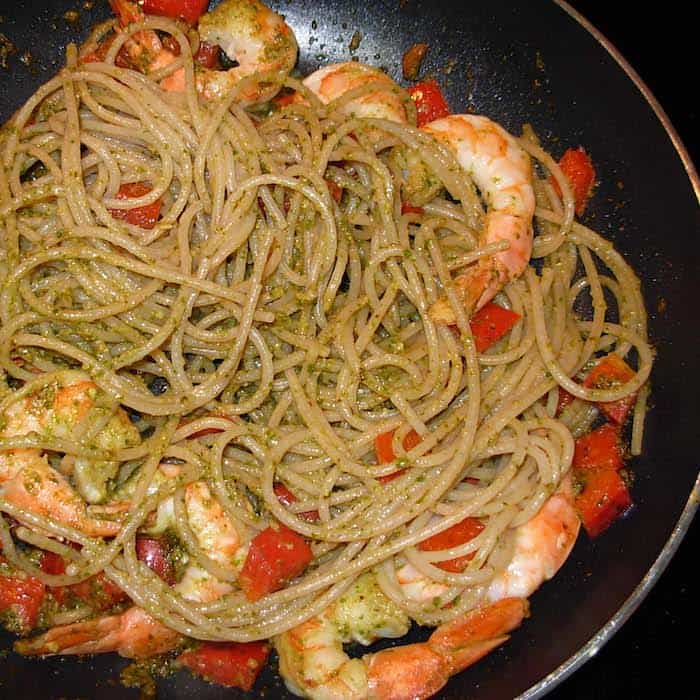 Basil pesto, pasta, shrimp, a little red bell pepper. Yum.
