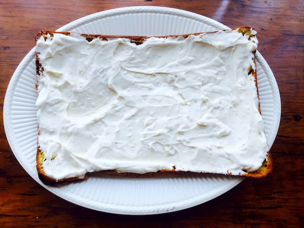 Spread the pudding-whipped cream mixture over the bottom portion of the pastry.