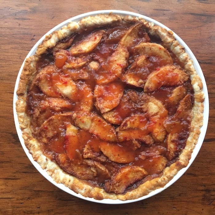 I made this Summertime Peach Tart with peach pepper jelly instead of apricot preserves, and it pops!