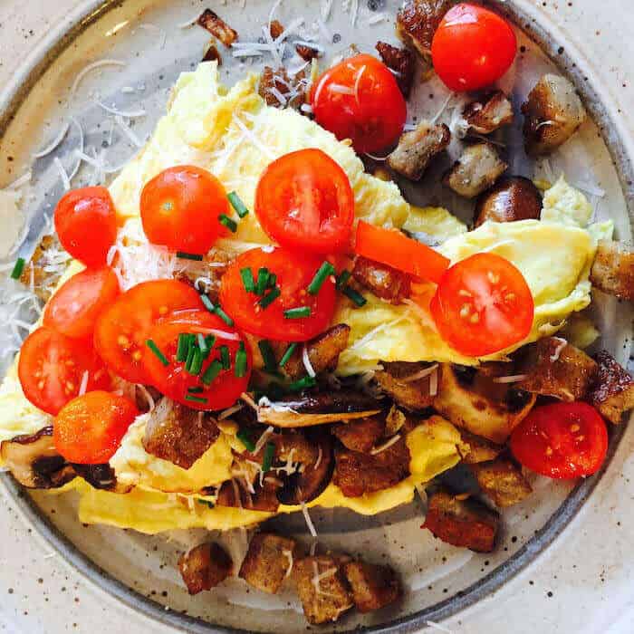 Mushroom Omelet with Tomato Garnish