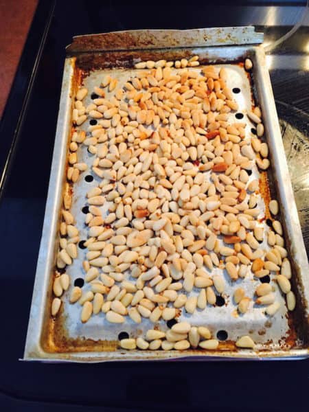 Spread the pine nuts in a single layer to toast.