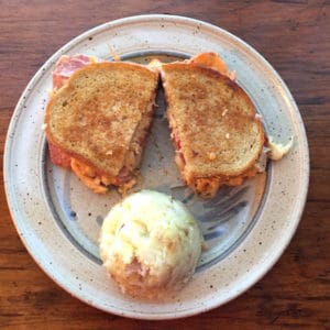 Classic Corned Beef Reuben Sandwich on Rye, shown with Colcannon. Great Irish meal.