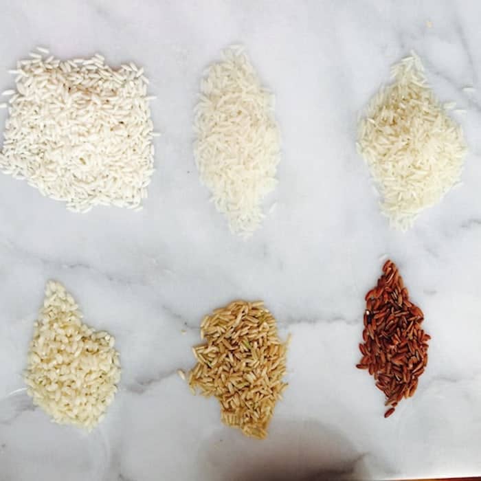 Top Row: Sticky Rice, Jasmine Rice, Basmati Rice. Bottom Row: Arborio Rice, Brown Rice, Red Rice.