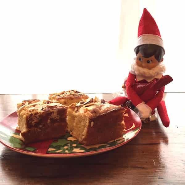 The elf is eyeing the Gluten Free Cinnamon Almond Coffee Cake!