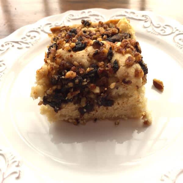 This Cherry Almond Coffee Cake is gluten free and topped with pecans. #cherryalmondcoffeecake #recipeideashop #sitdownandrelax
