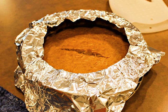 baking a pie with aluminum foil around the crust to keep it from burning