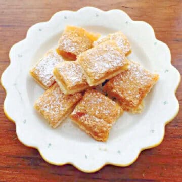 old fashioned lemon squares with a dusting of powdered sugar