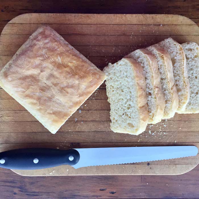 Sliced loaf of Best White Bread from a Sponge recipe.