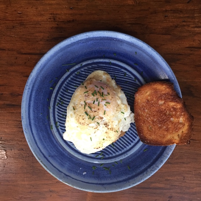 Now here's an amazing breakfast. Make a Stacked Cheesy Grits & Sausage by placing a cooked, hot sausage patty on a plate. Add 1/2 cup grits and one fried egg. Oh my! Absolutely delicious. (Beautiful plate by Elizabeth Krome, Quail Run Pottery.)