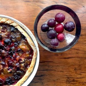 Plum Tart with Gluten Free Crust, shown with sugar plums