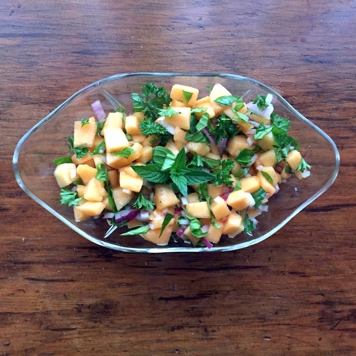 Cantaloupe Melon Relish with a light vinaigrette is perfect atop a bed of greens.