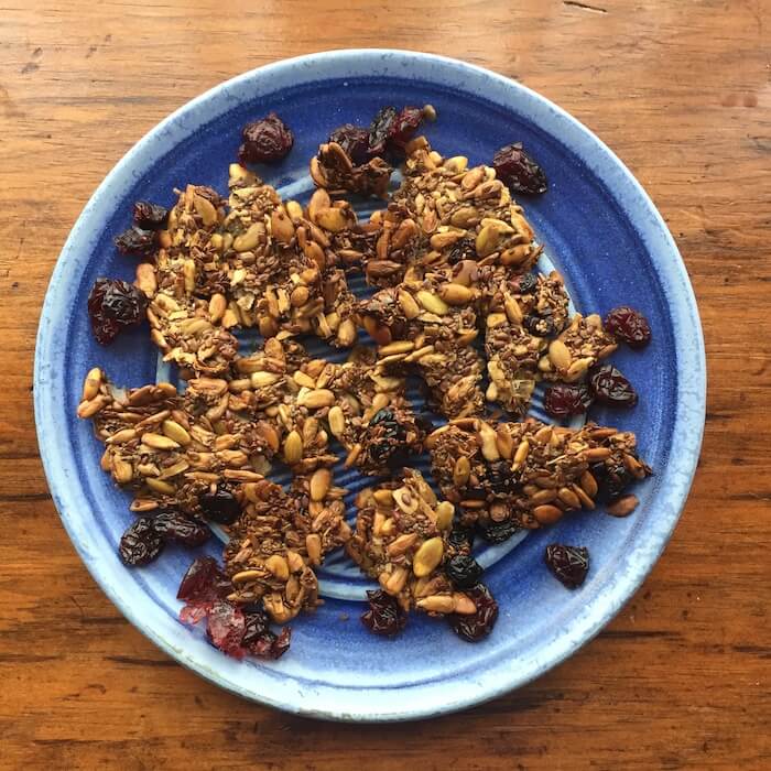 Keep Sweet Five Seed Crackers available for snacking anytime. Beautiful plate by Elizabeth Krome, Quail Run Pottery.