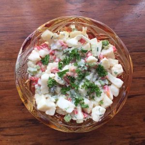 Pickle Potato Salad is creamy and a bit sweet.