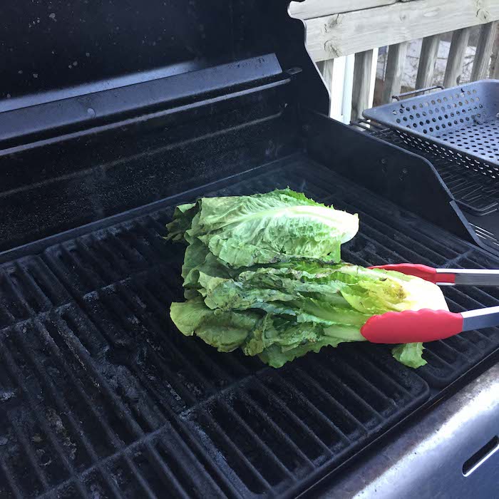 Step 4: Grill 2 minutes. Turn the lettuce over.