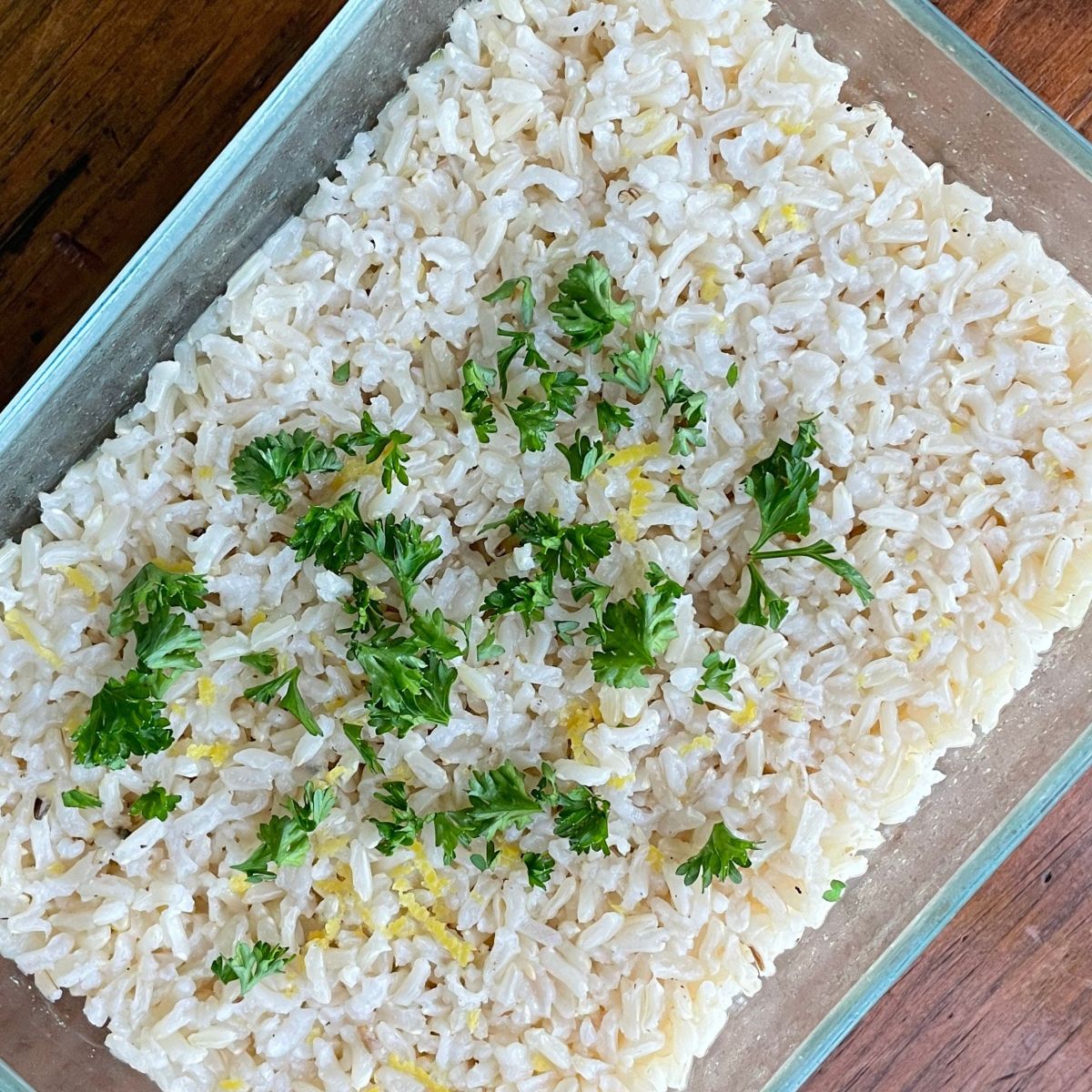 glass pan of cooked lemon rice