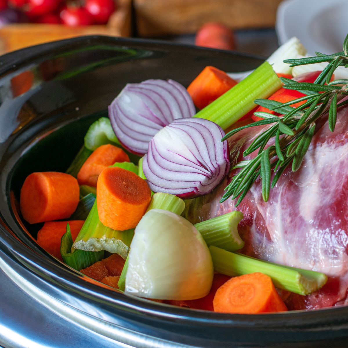 meat and veggies in the slow cooker.