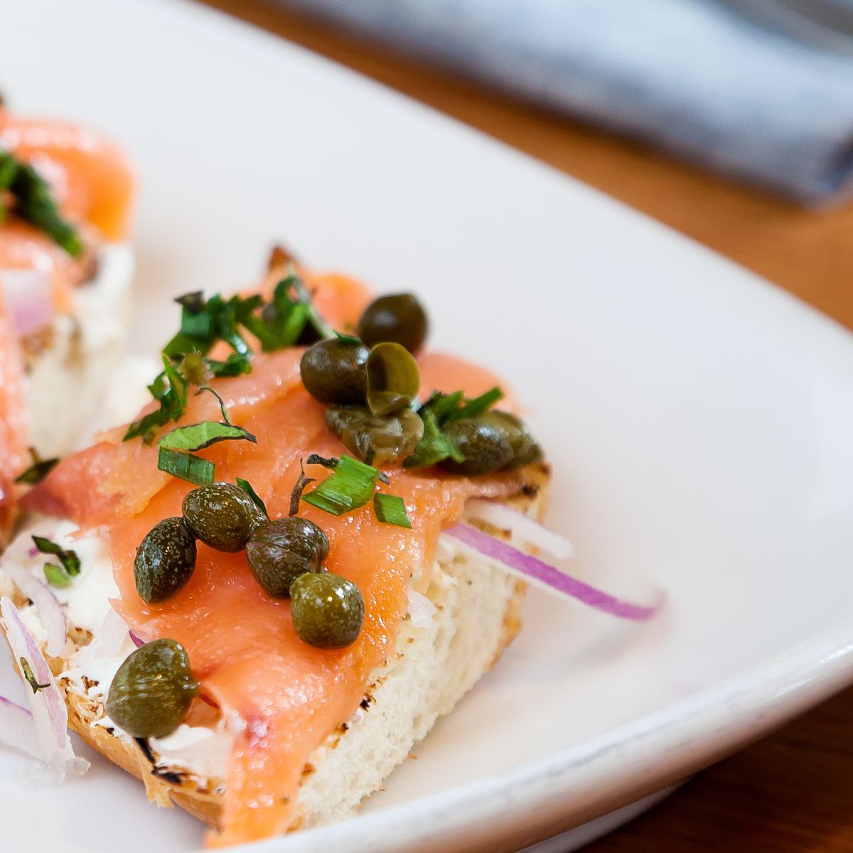 Mini appetizer with salmon and capers.