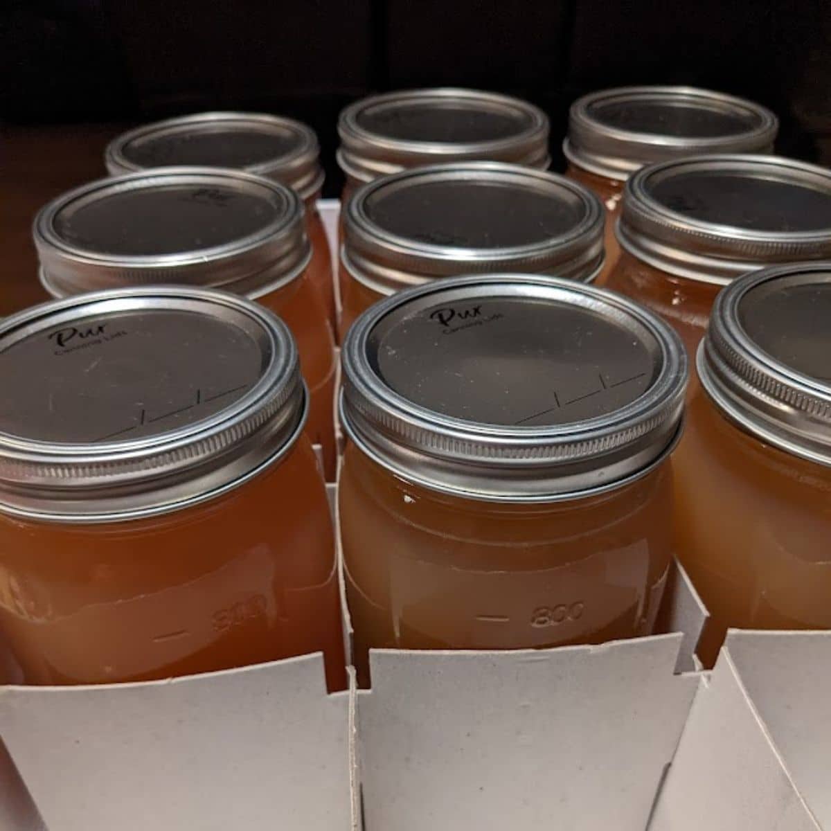 white grape juice in quart jars.