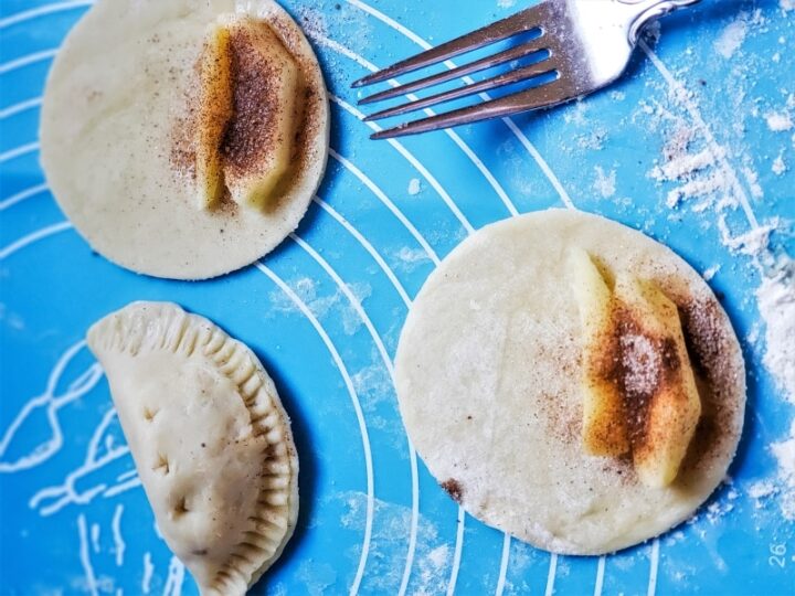 make apple empanadas with cinnamon and caramel sauce