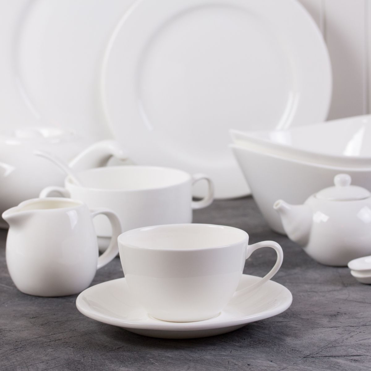  a set of white dishes. 