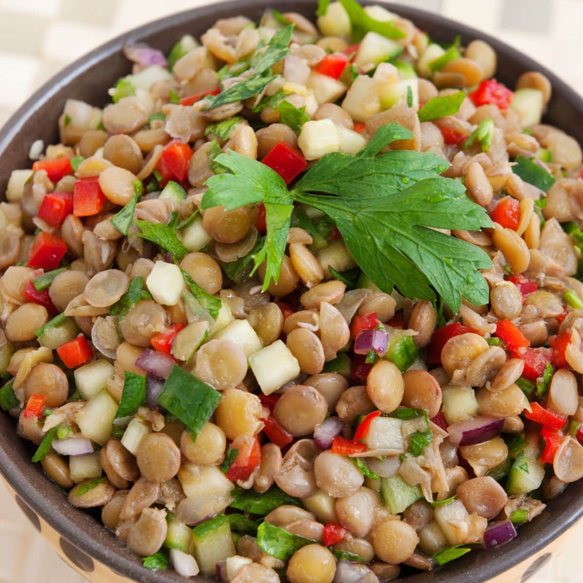 lentil salad with onions, red pepper, and herbs.