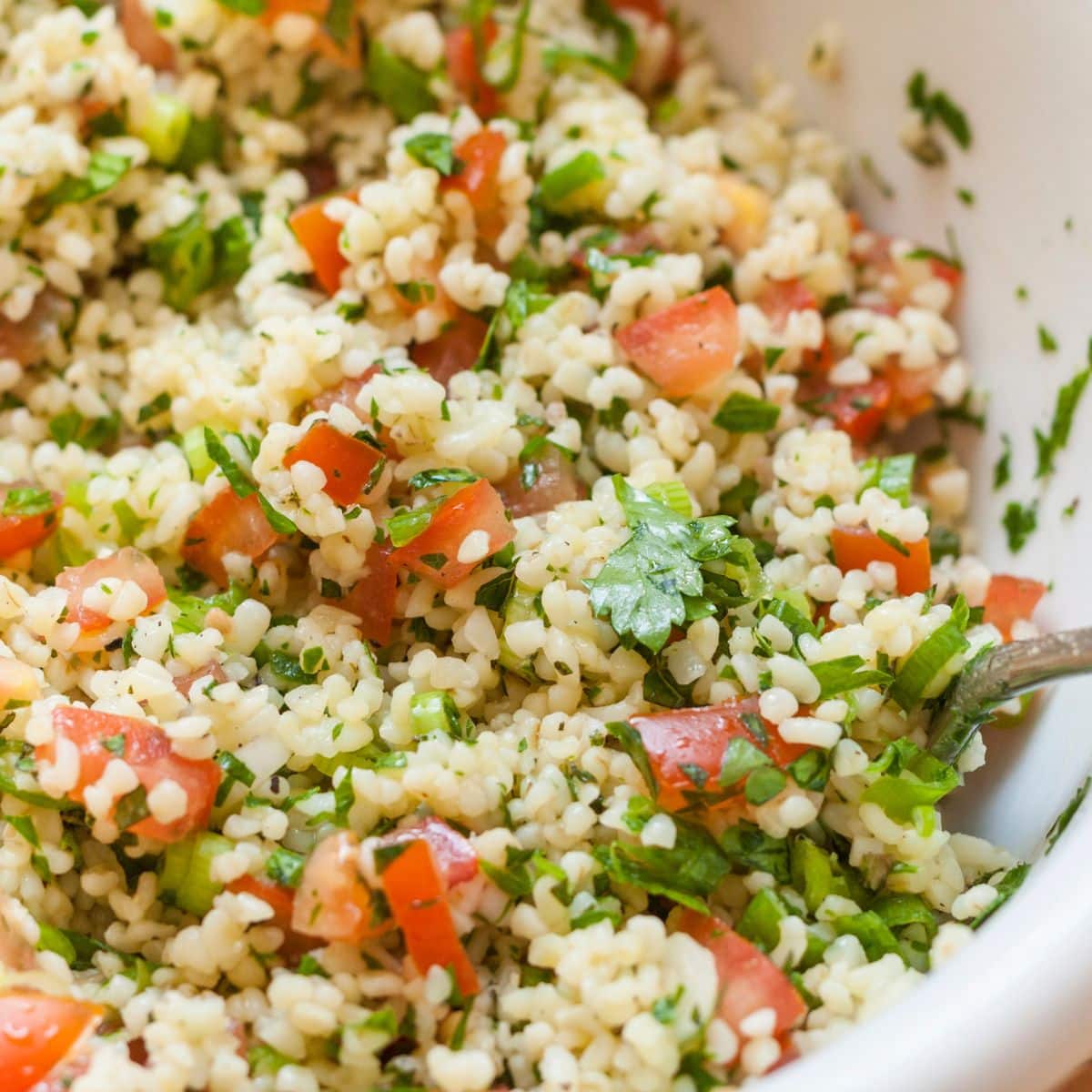 Tabbouleh - a salad made with bulgur, tomatoes, mint, onions, lemon juice and parsley.