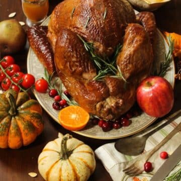 Thanksgiving meal of roasted turkey, mashed potatoes and gravy.