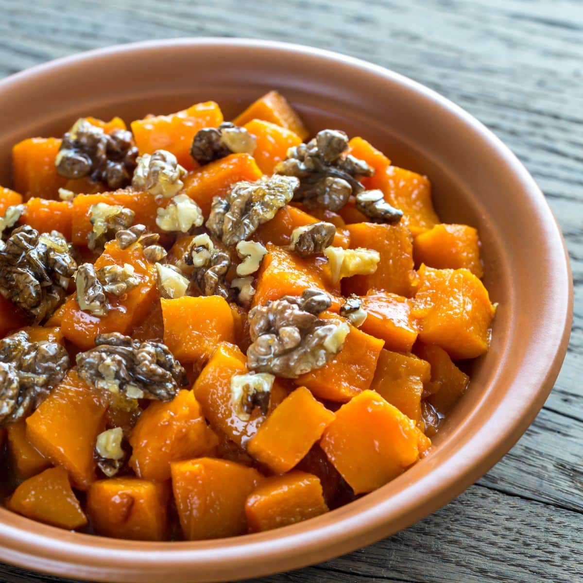 Cubed roasted squash with walnuts.