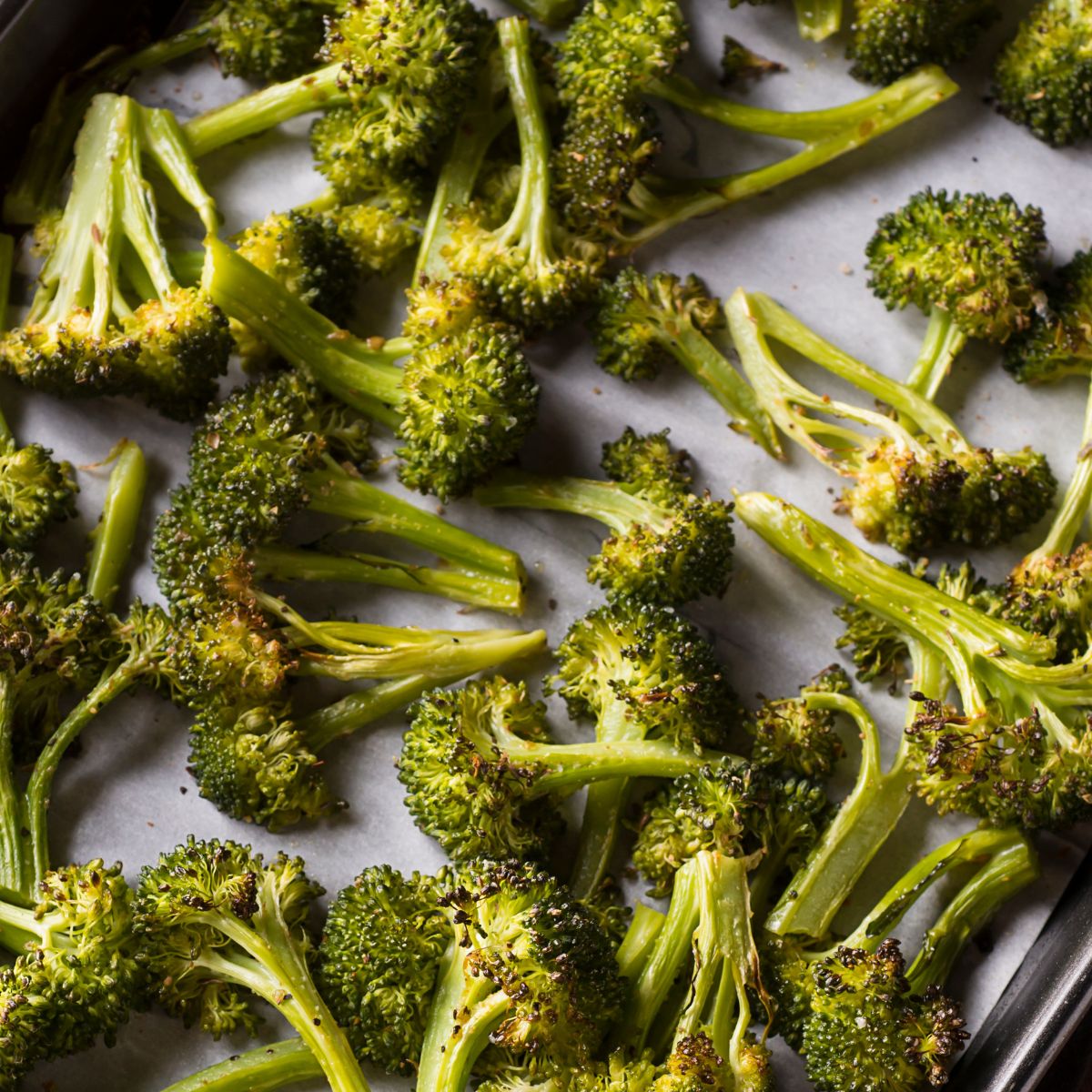 A pan of roasted broccoli.