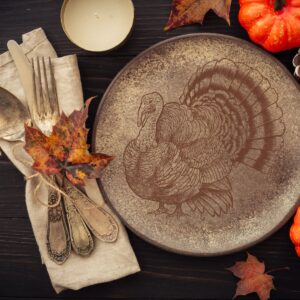 thanksgiving dinner setting featuring a a plate with a turkey design.