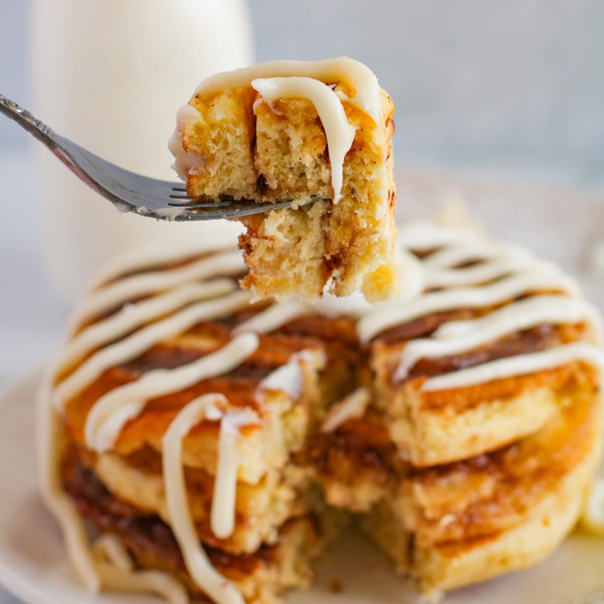 cinnamon roll pancakes with cream cheese icing