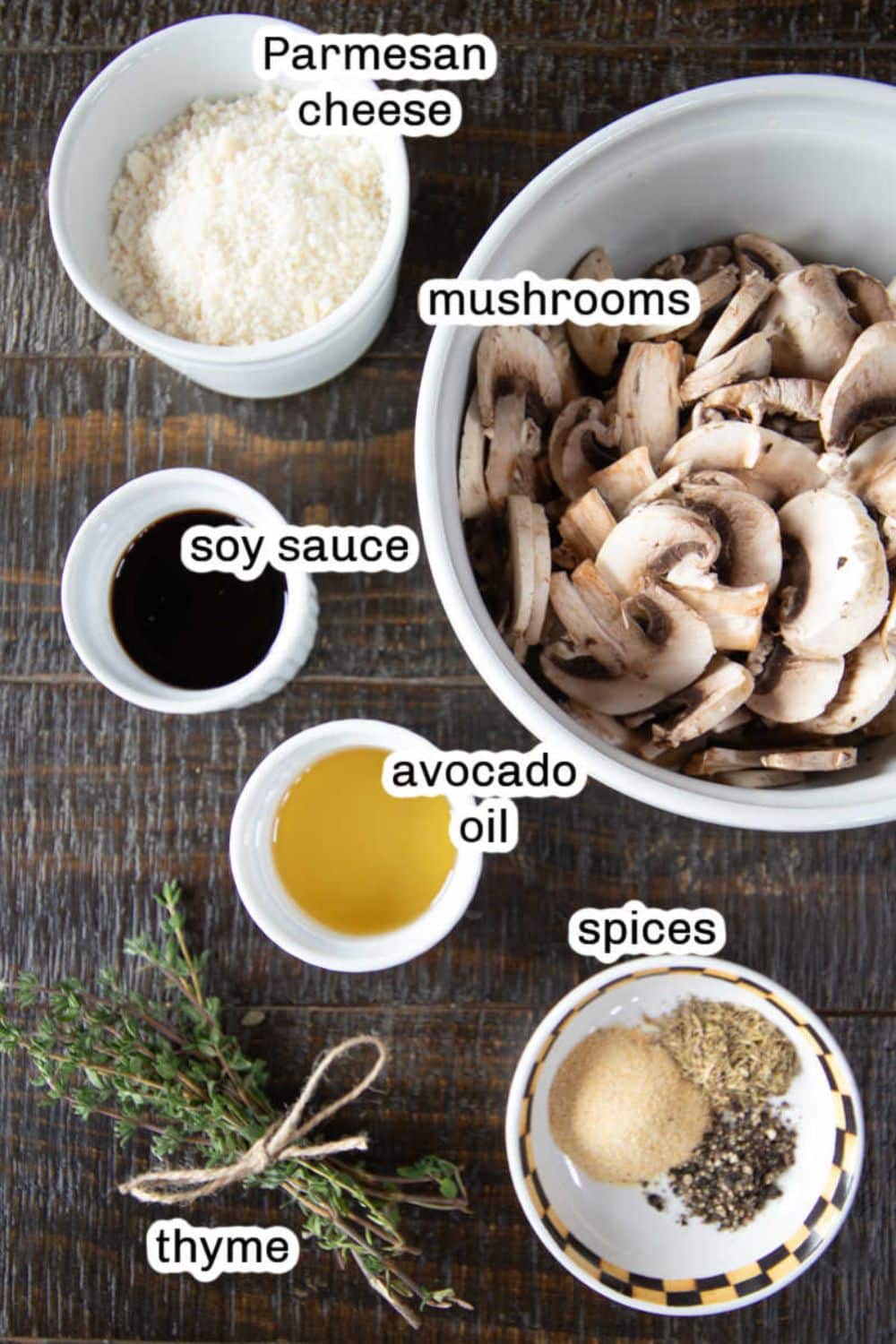 Ingredients for air fried garlic mushrooms include mushrooms, cheese, soy sauce, avocado oil, thyme and spices.