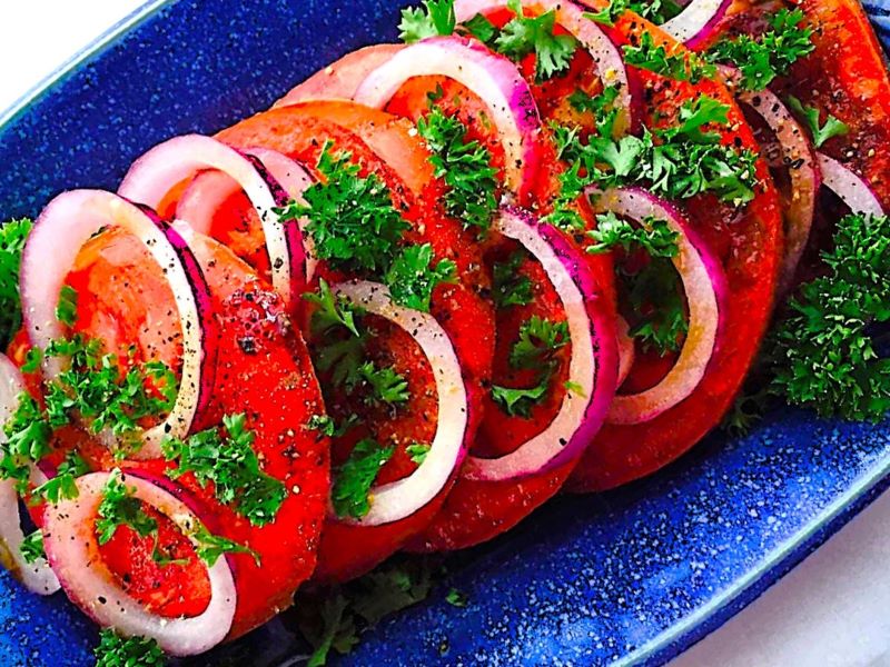 sliced tomatoes and onions are an easy side dish