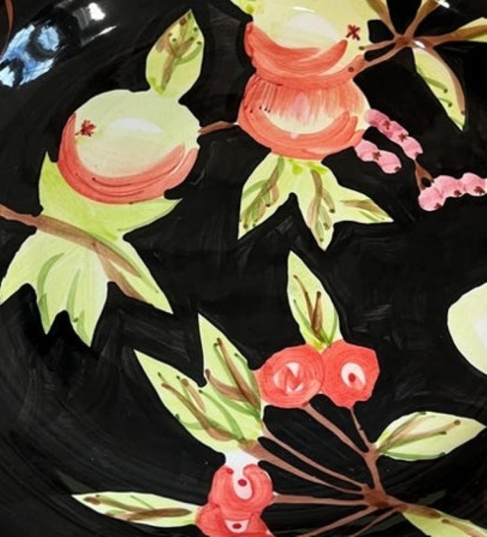 Totally Today was a dinnerware brand known for its wide array of decorative patterns, many of which have been discontinued and are now sought after by collectors. Among these, the black dishes adorned with fruit patterns stand out for their distinctive design. This dish pattern featuring purple grapes, green leaves, and smooth design elements was especially popular.