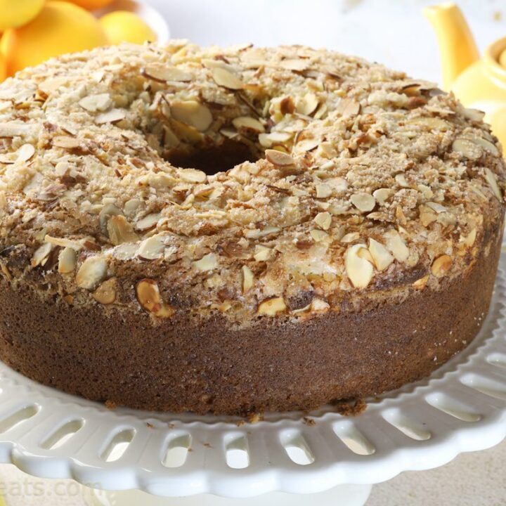 coffee cake in a bundt pan with nuts