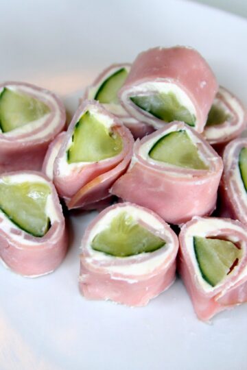kosher dill pickles wrapped in cream cheese and deli ham