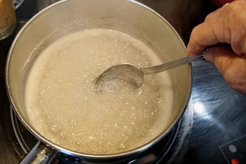 sugar and corn syrup boiling for cornflake candy