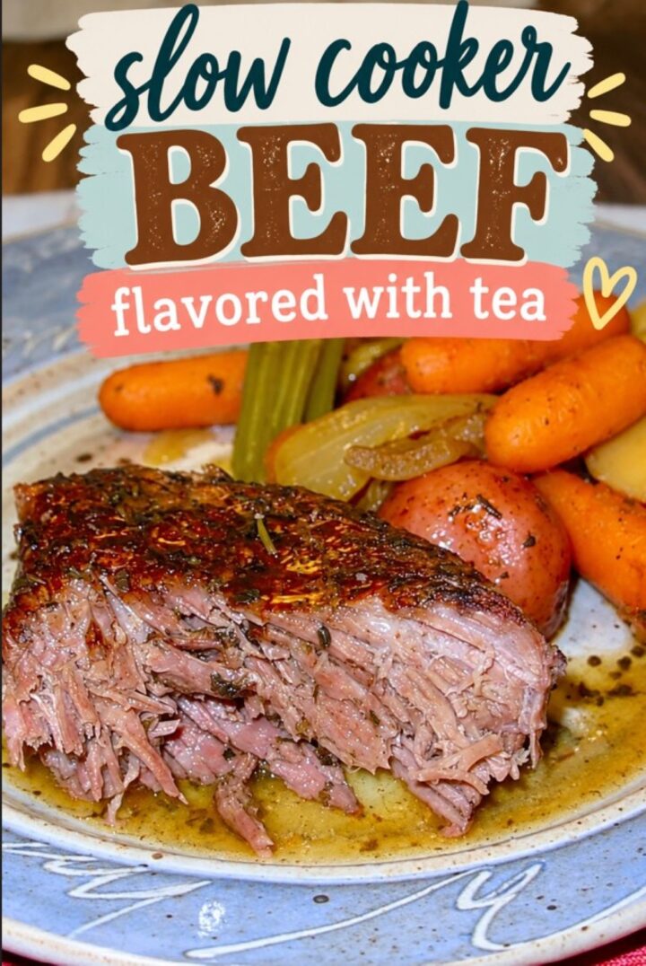 A plate with a slice of slow-cooked beef, carrots, potatoes, and celery. Text above reads, Winter Pot Roast: Slow cooker beef flavored with tea in colorful, decorative fonts—your new favorite beef roast recipe for cozy nights.